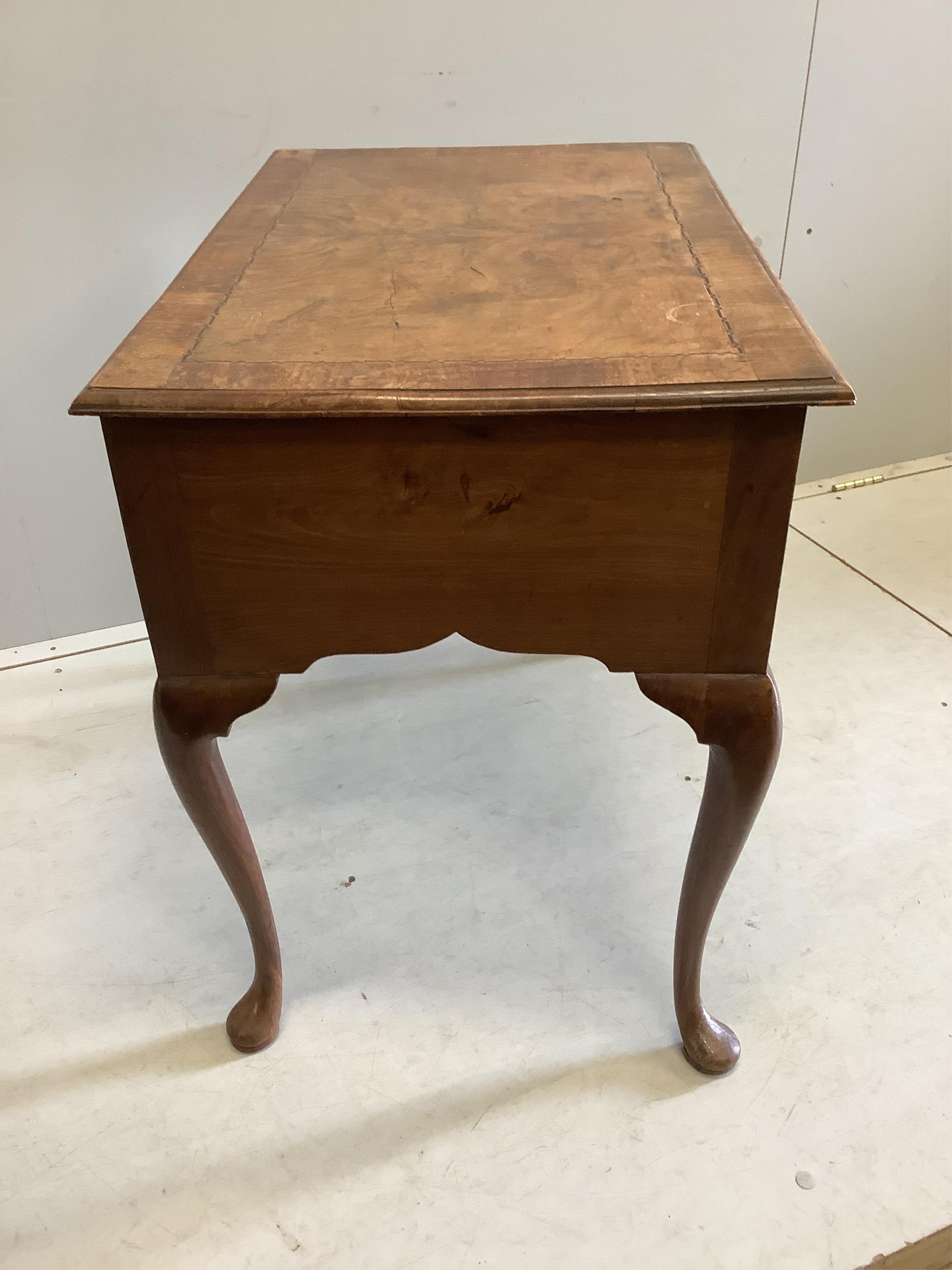 An 18th century inlaid walnut lowboy, width 77cm, depth 50cm, height 67cm. Condition - fair